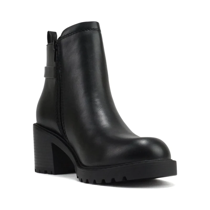 Bottines chelsea noires à talon bloc, semelle crantée et bride décorative pour femme